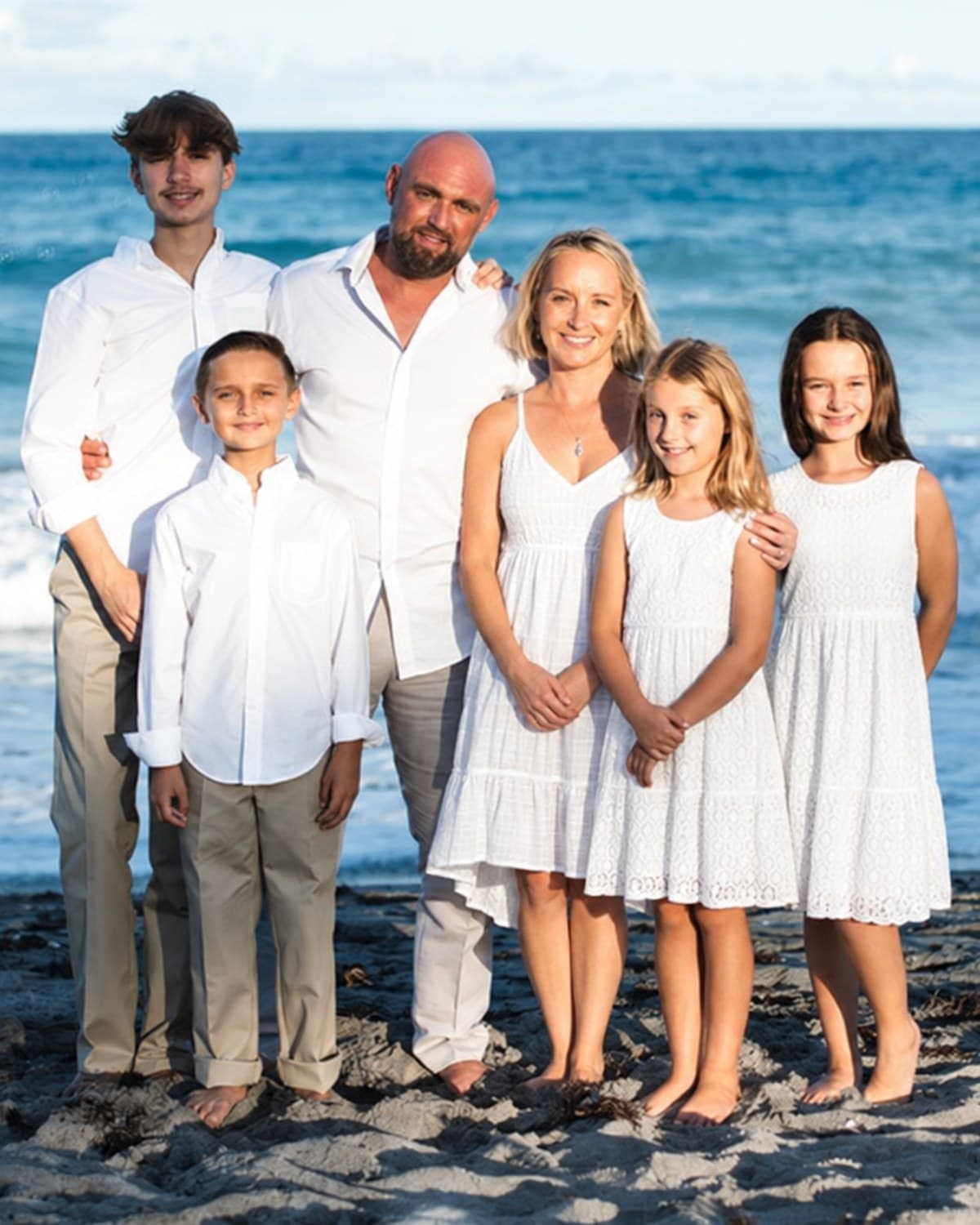 Michael Battaglia and his family on the beach in Palm Beach County